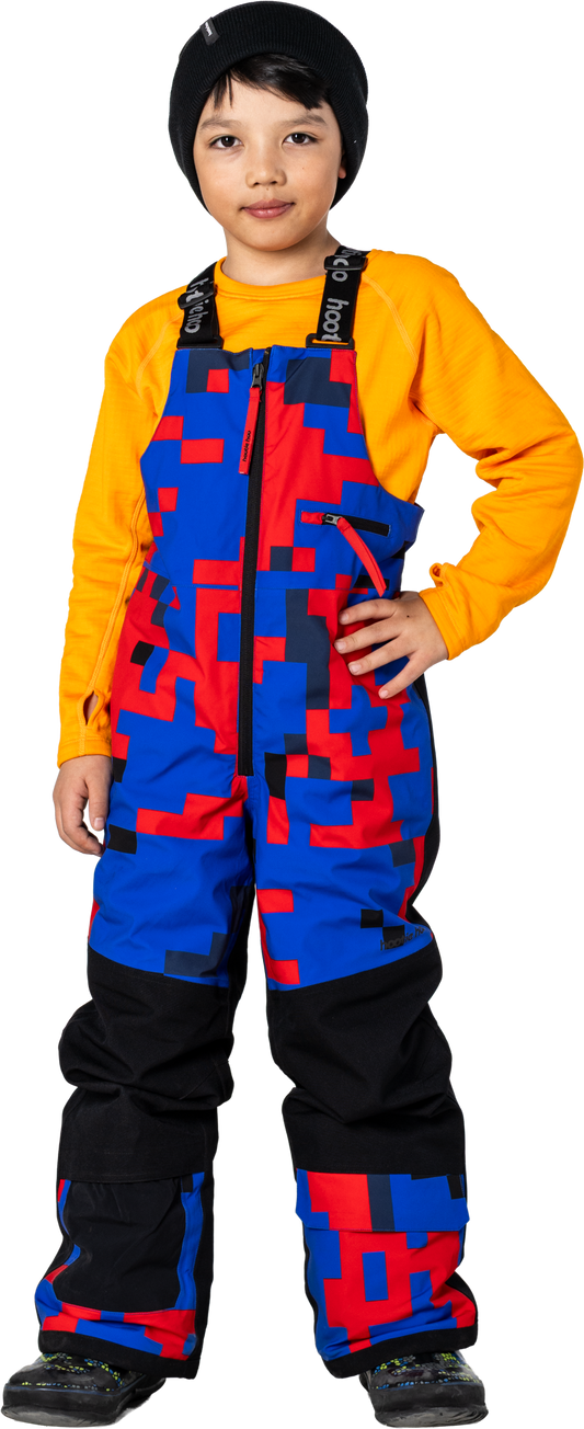 Hootie Hoo Kids Pinnakle Insulated Bib Snow Pants in Vivid Blue/Block Camo — on-model lifestyle